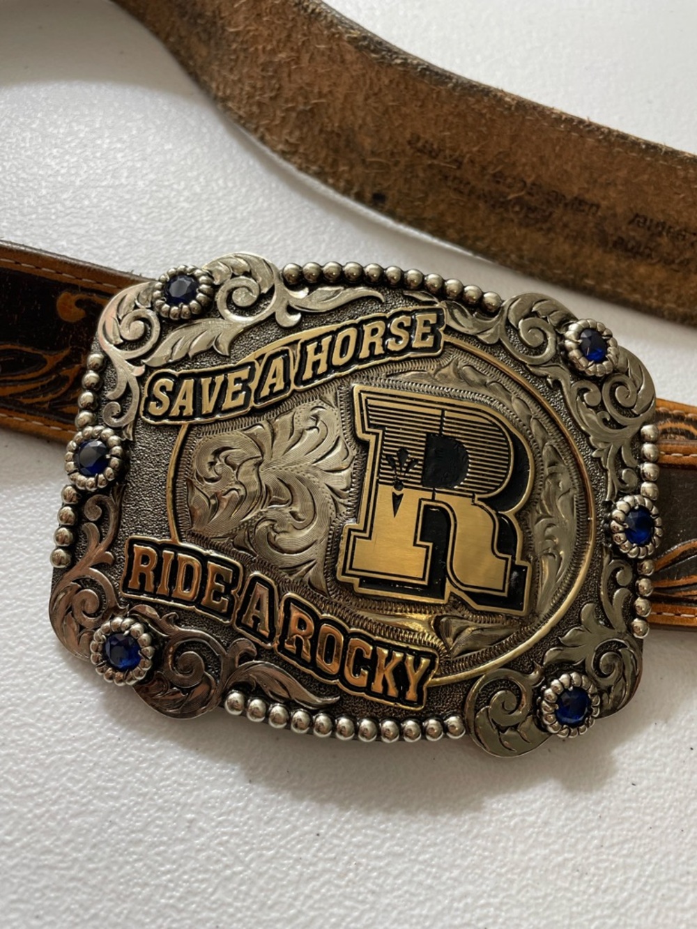 Tony Lama Gold and Brown 'Save A Horse Ride A Rocky' Western Belt Buckle
